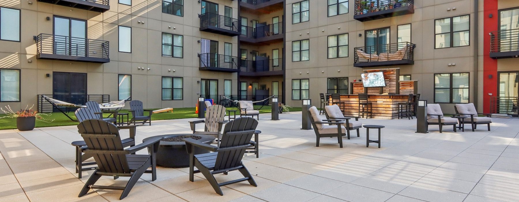 a table and chairs outside a building